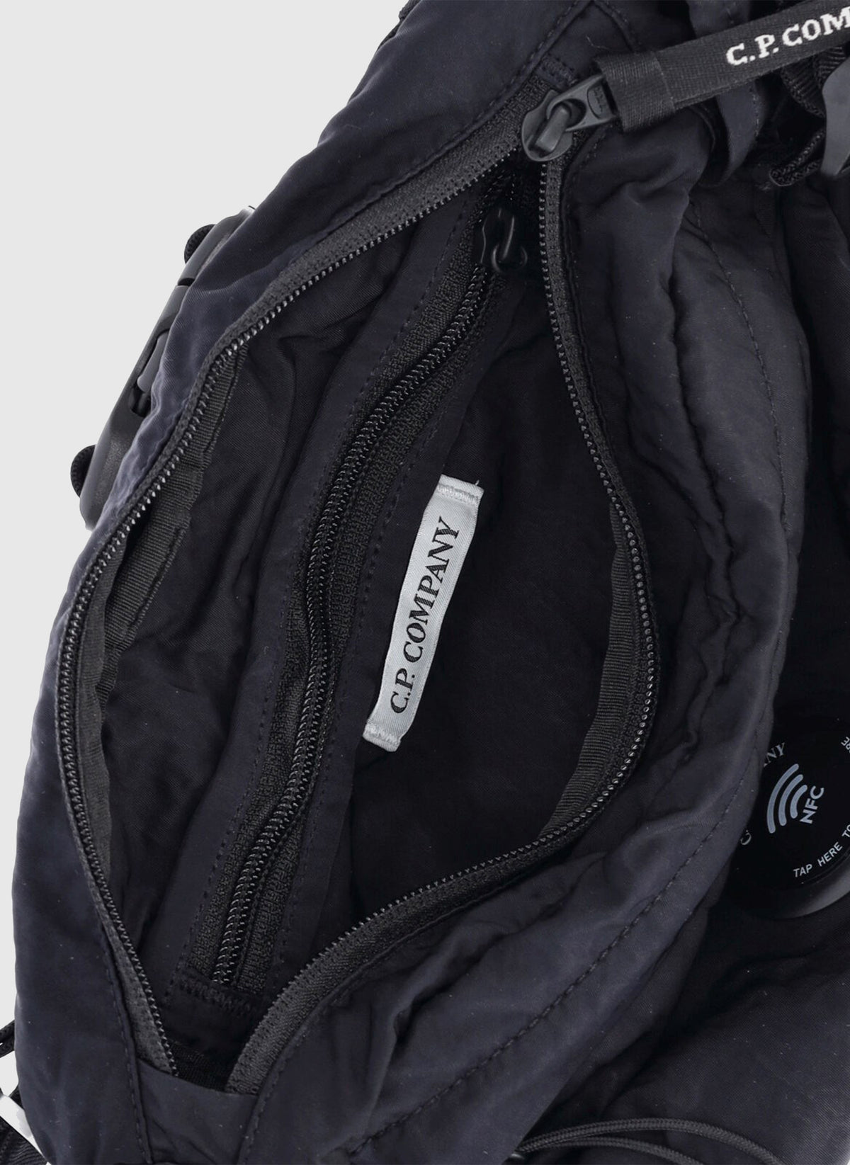 Lens Crossbody Umhängetasche - Total Eclipse