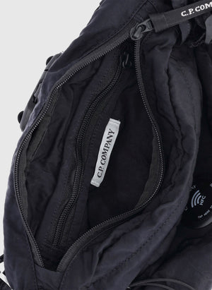 Lens Crossbody Umhängetasche - Total Eclipse